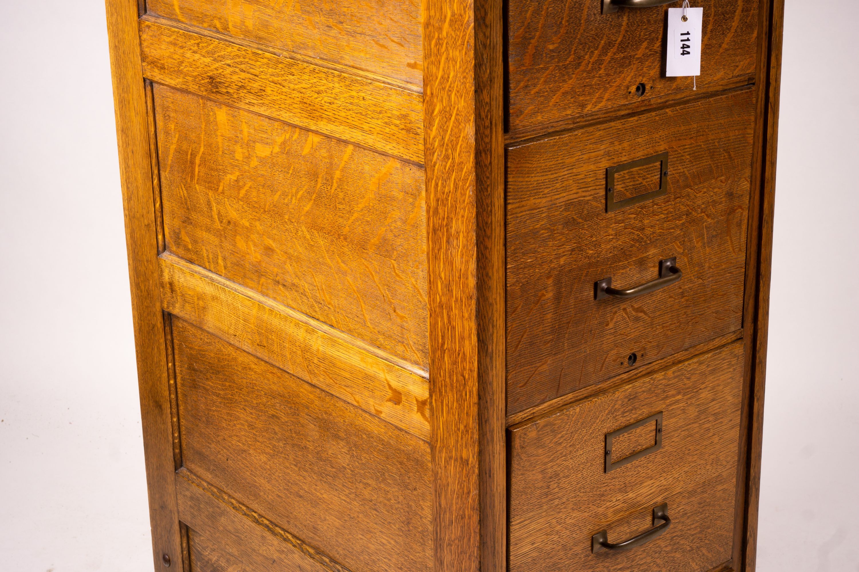 An early 20th century oak four drawer filing cabinet, W.44cm D.70cm. H.132cm